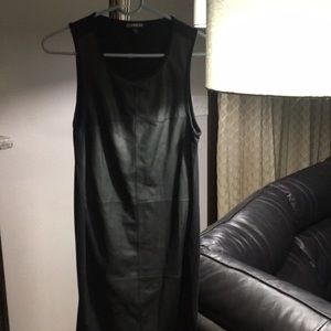 Black mini dress.  Leather material in front